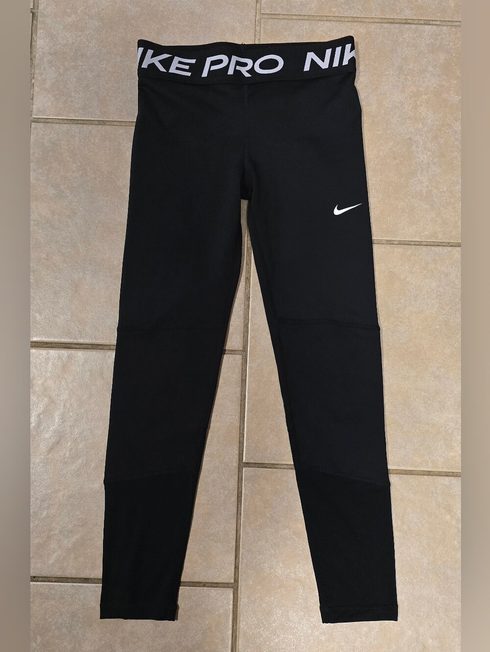 Nike Black Kids Performance Leggings with White Swoosh